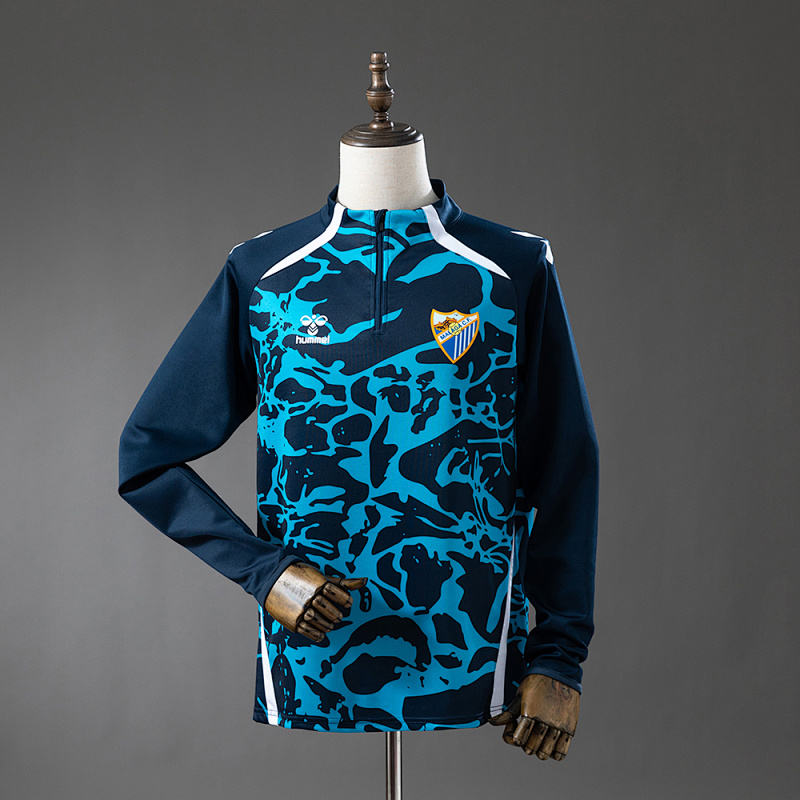 Malaga 25/26 Training Top Blue S-XXL (front)
